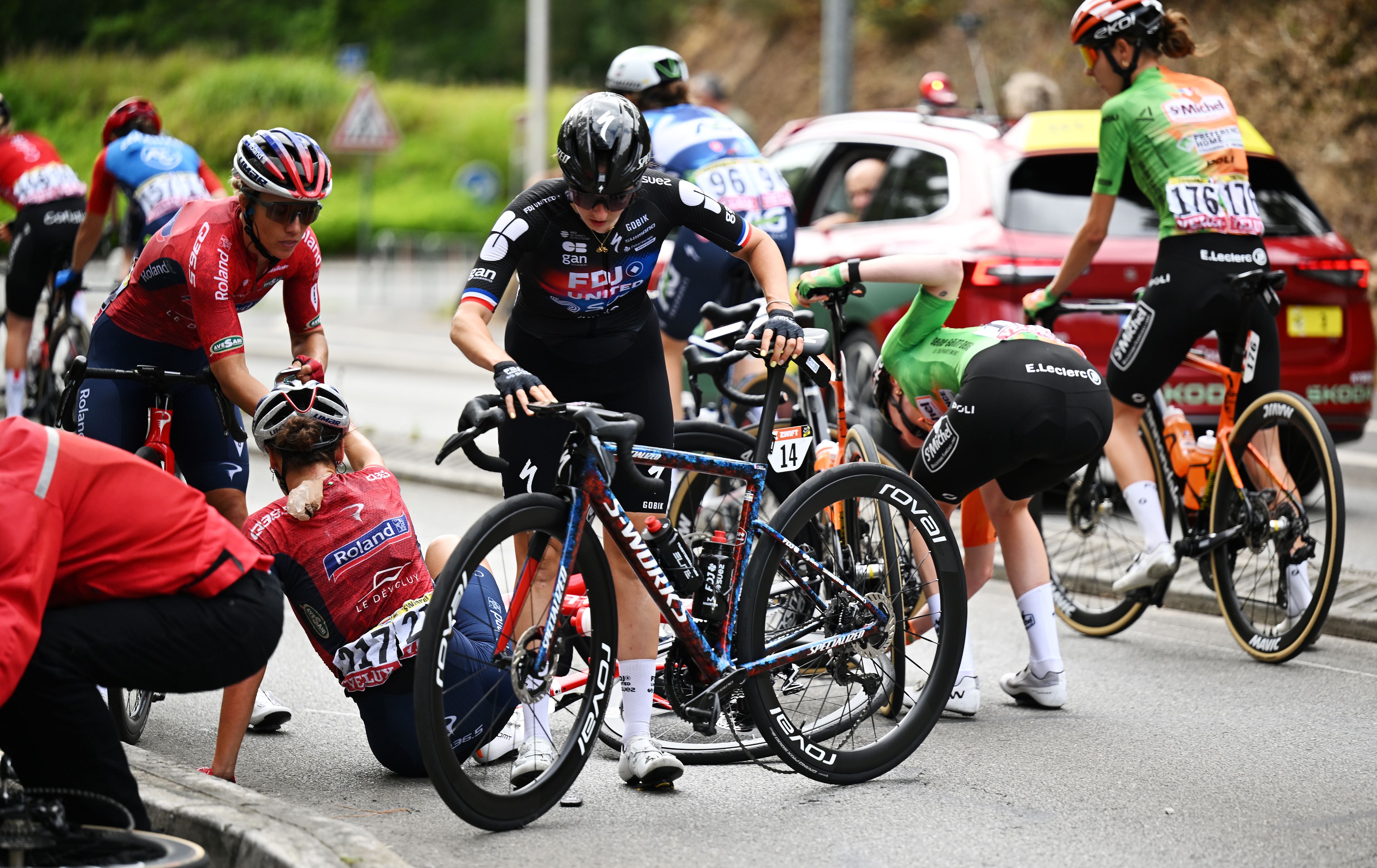 Juliette Labous gets up after crashing in the neutral zone of stage one of the Tour de France Femmes 2025.