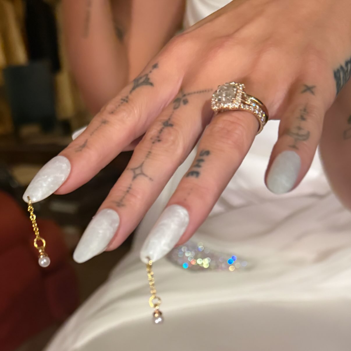 Dove Cameron's marble after party wedding manicure.
