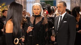 Tamara Tunie and Clifton Davis as Anita and Vernon Dupree at a wedding in Beyond the Gates