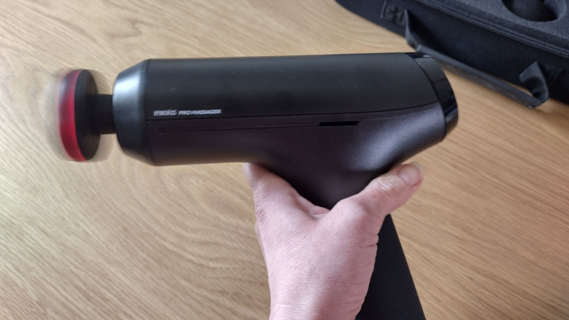 homedics pro physio massage gun in use