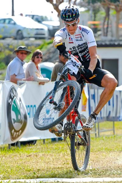 Jaroslav Kulhavy (Rubena Birell Specialized) shows off his wheelie at the finish upon winning.