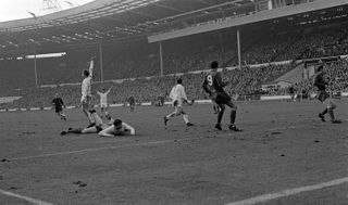 QPR players (in white) celebrate Mark Lazarus' winning goal in the 1967 League Cup final against West Brom