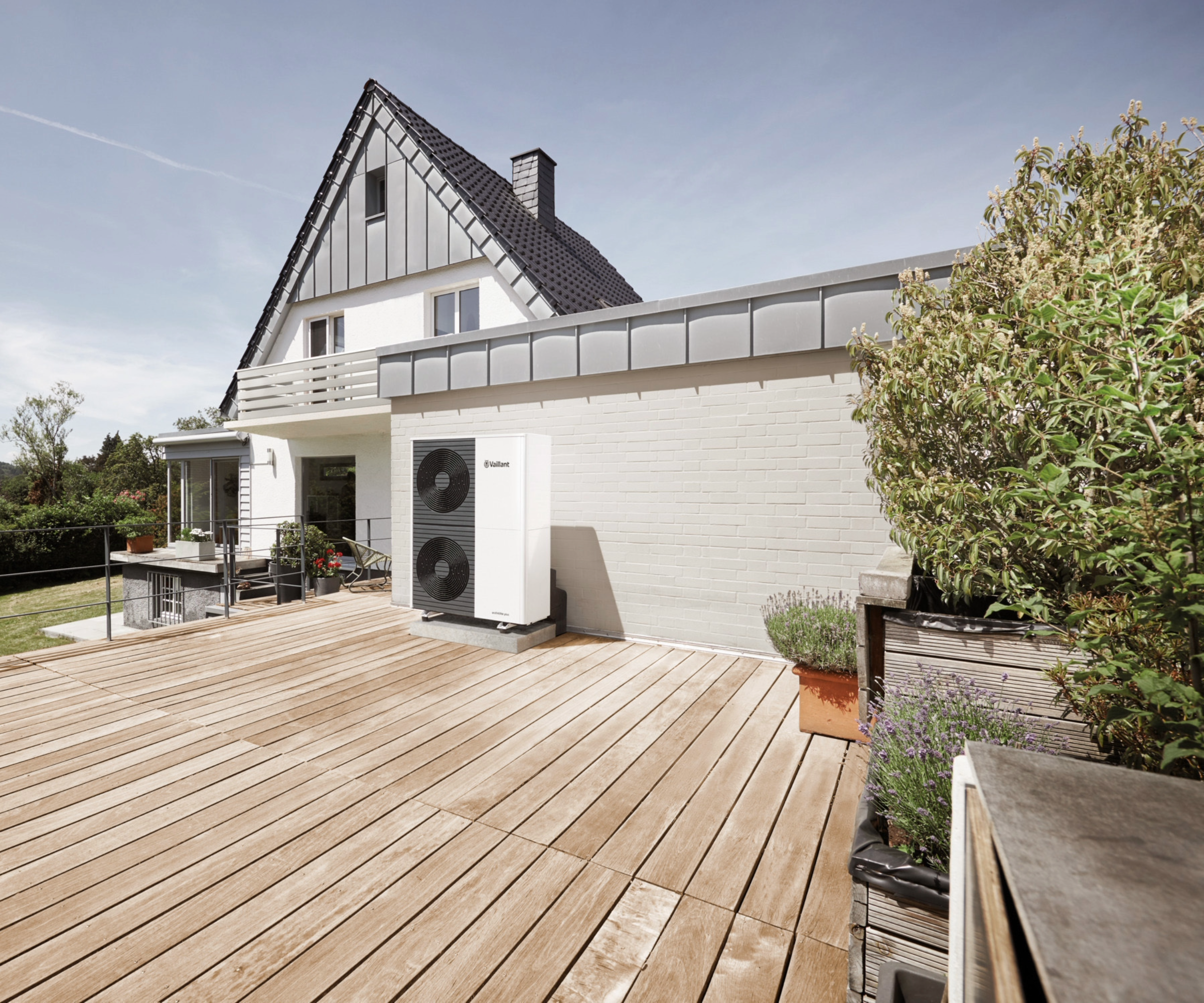 House with heat pump on decking