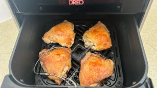 Dreo ChefMaker Combi Fryer finished chicken thighs with Chef Mode