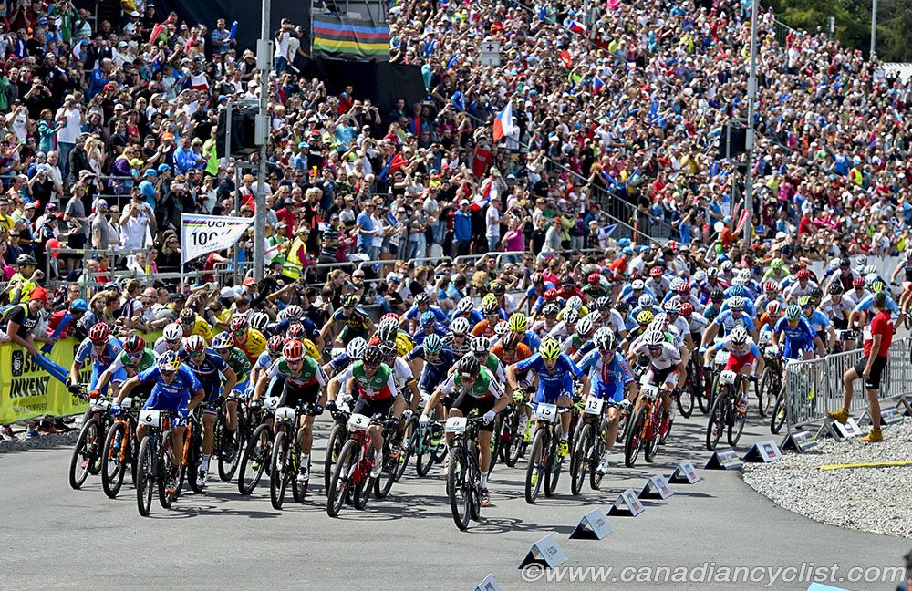 The crowd of over 23,000 observe the start of the Elite Men's race