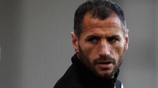 BLACKBURN, ENGLAND - FEBRUARY 12: Substitute Shefki Kuqi of Newcastle warms up during the Barclays Premier League match between Blackburn Rovers and Newcastle United at Ewood Park on February 12, 2011 in Blackburn, England. (Photo by Dean Mouhtaropoulos/Getty Images)