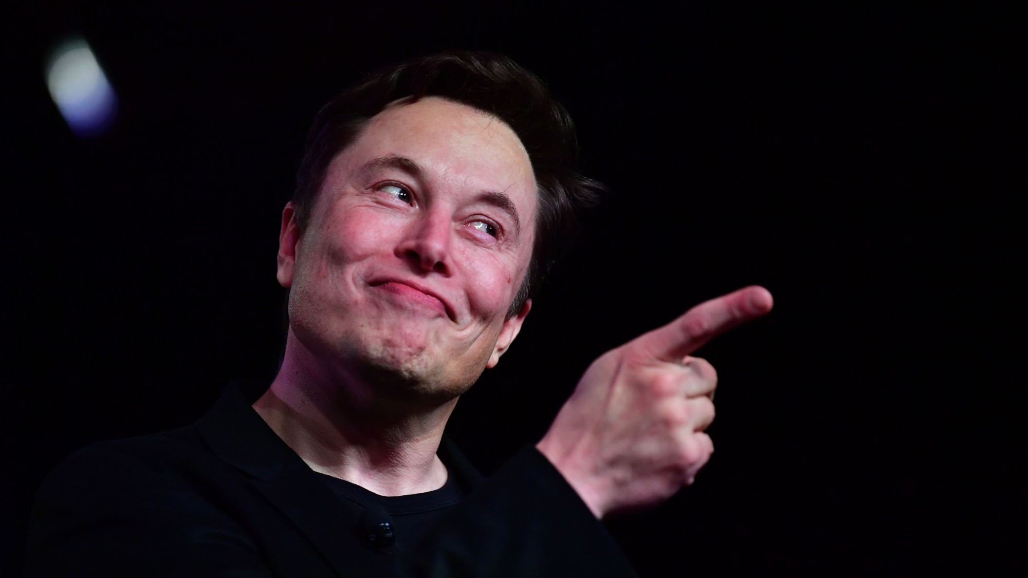 Elon Musk pointing