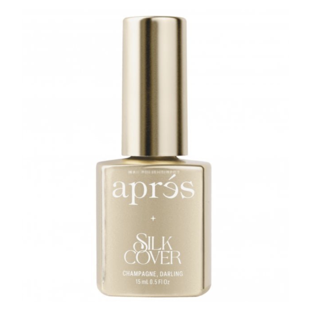 A product shot of the Apr&amp;eacute;s Silk Cover Gel Polish Collection in shade Champagne, Darling (a metallic gold colour), on a white background