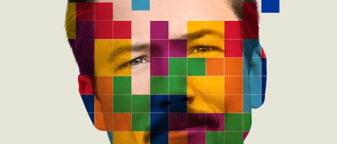 Taron Egerton as Henk Rogers, with colored blocks in front of him, in the Tetris poster.
