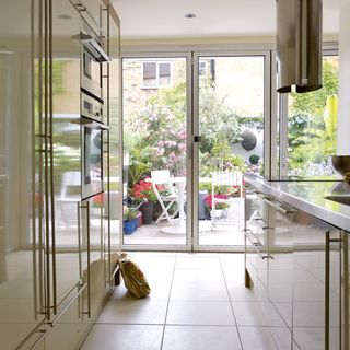 kitchen with cabinet and glass partition