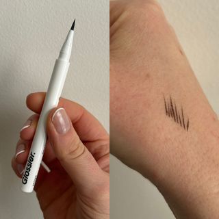 Laura holding and swatching Glossier Brow Flick