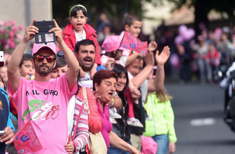 Tifosi pack the roadside all dressed in pink