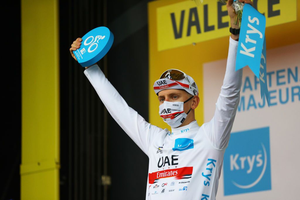 VALENCE FRANCE JULY 06 Tadej Pogaar of Slovenia and UAETeam Emirates white best young jersey celebrates at podium during the 108th Tour de France 2021 Stage 10 a 1907km stage from Albertville to Valence LeTour TDF2021 on July 06 2021 in Valence France Photo by Tim de WaeleGetty Images