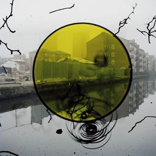 yellow circle over buildings