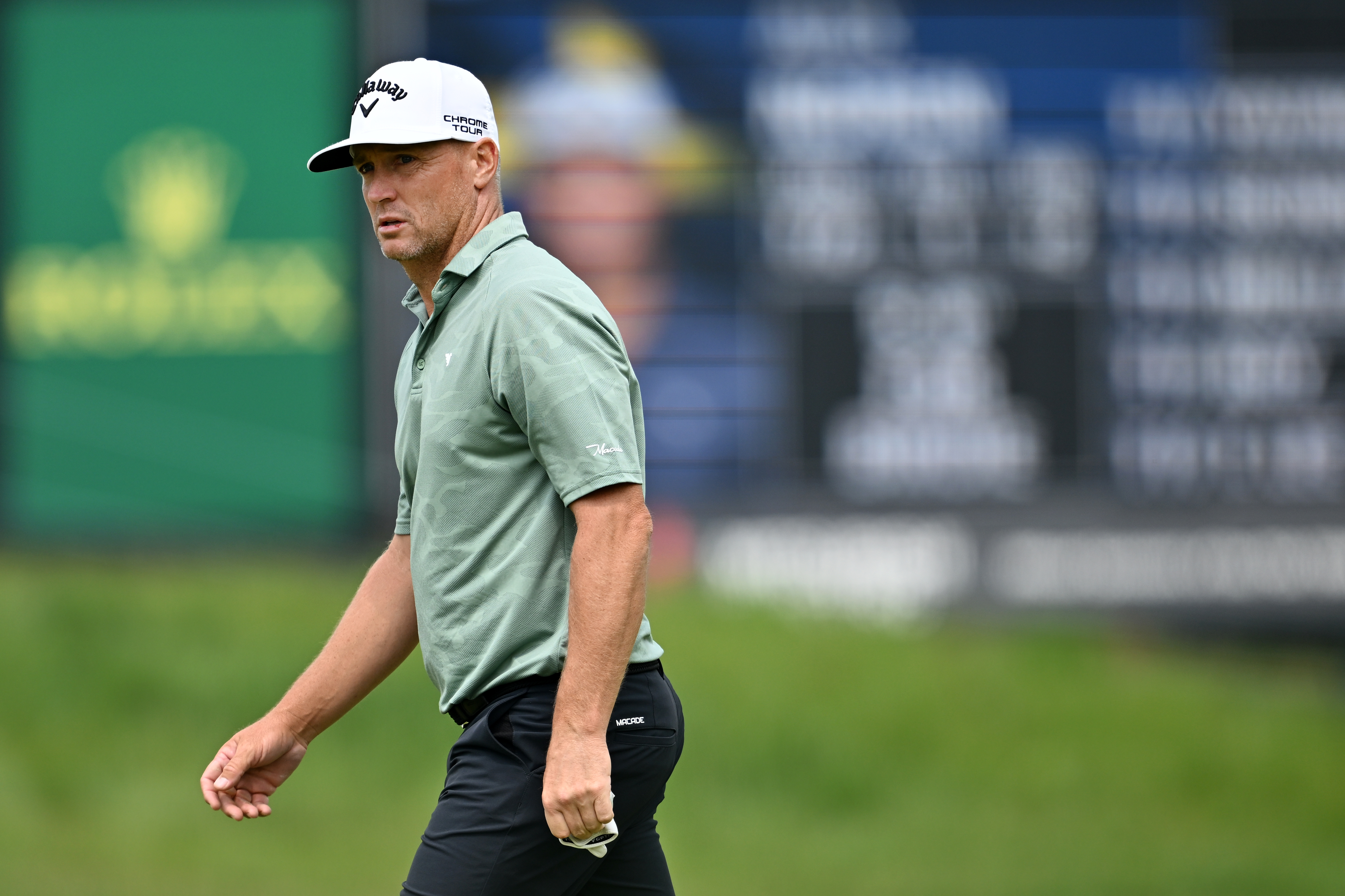 Alex Noren walks off the green