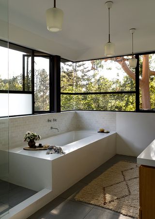 Modern bath with tree views