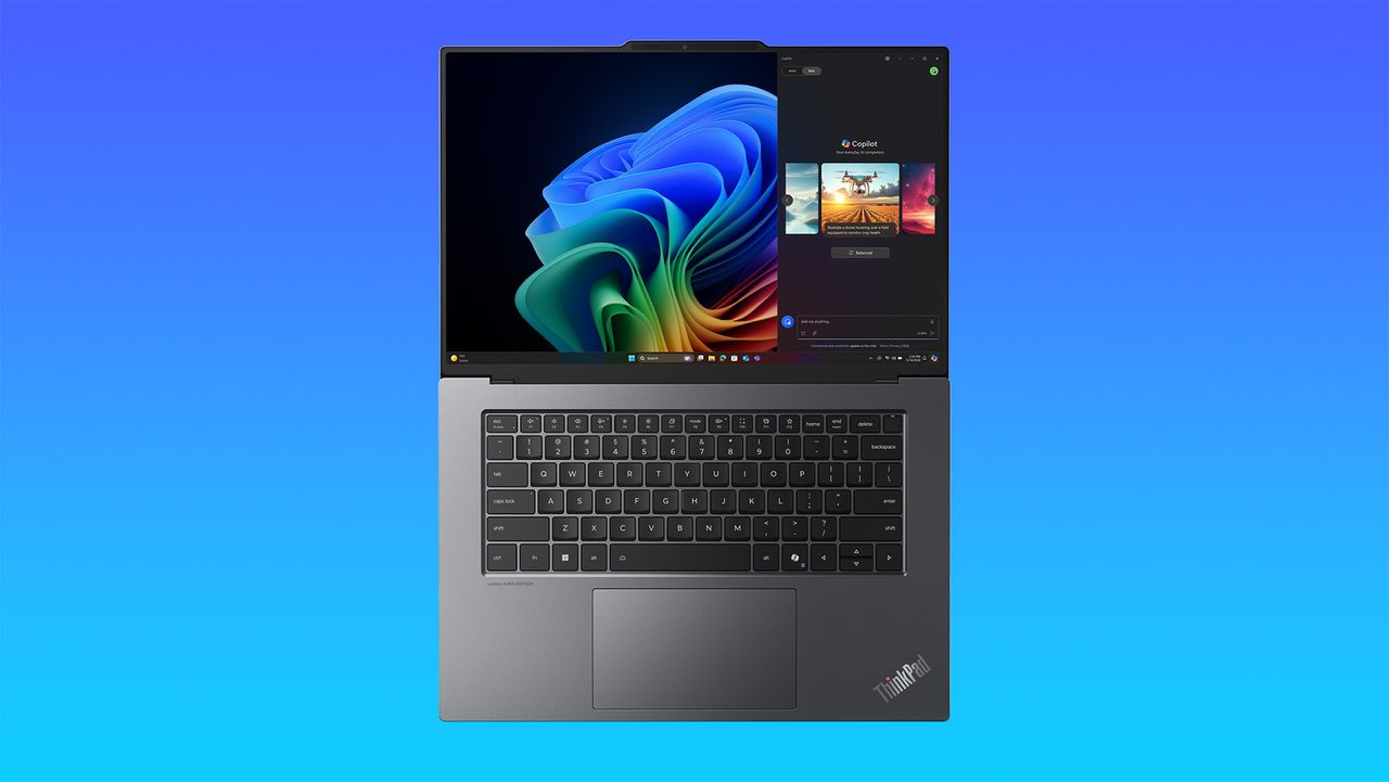 Lenovo ThinkPad X9 15 Aura Edition on a light blue to dark blue gradient background.