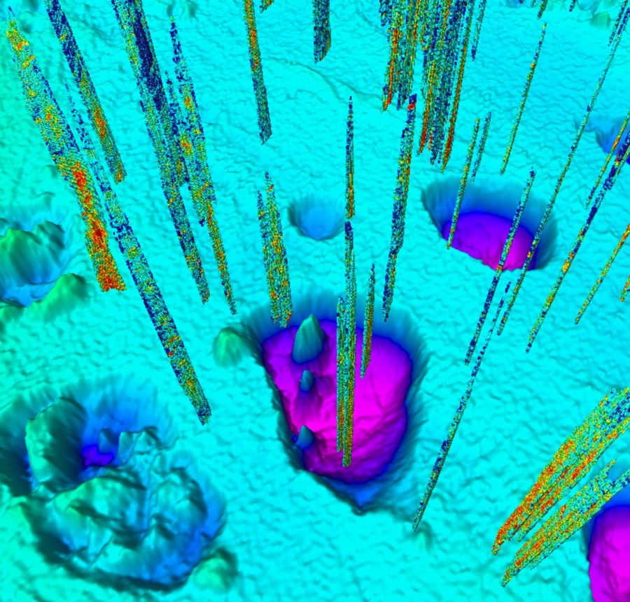 Giant craters along the floor of the Barents Sea were created when methane gases erupted about 11,600 years ago. Today, smaller seeps (vertical lines) still bubble up around the craters. 