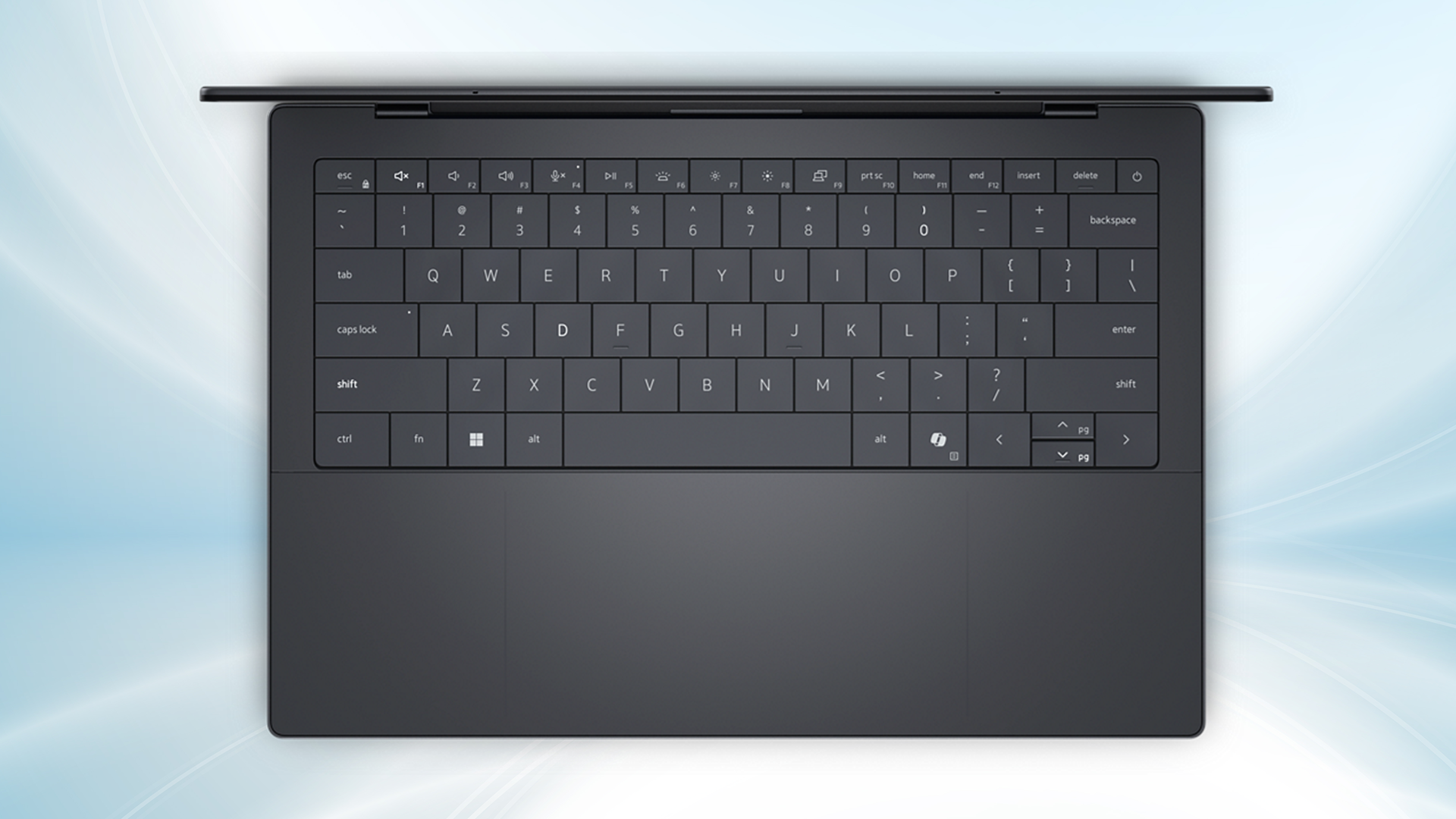 A sleek, black laptop keyboard viewed from above on a light blue gradient background. The minimalist design conveys a modern and professional tone.