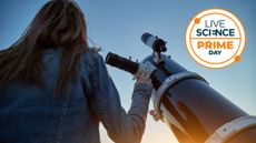 woman using a telescope