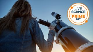 woman using a telescope
