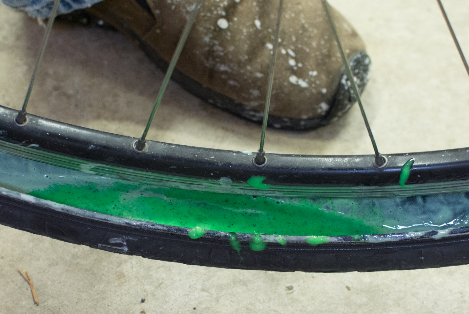 image of green tyre sealant