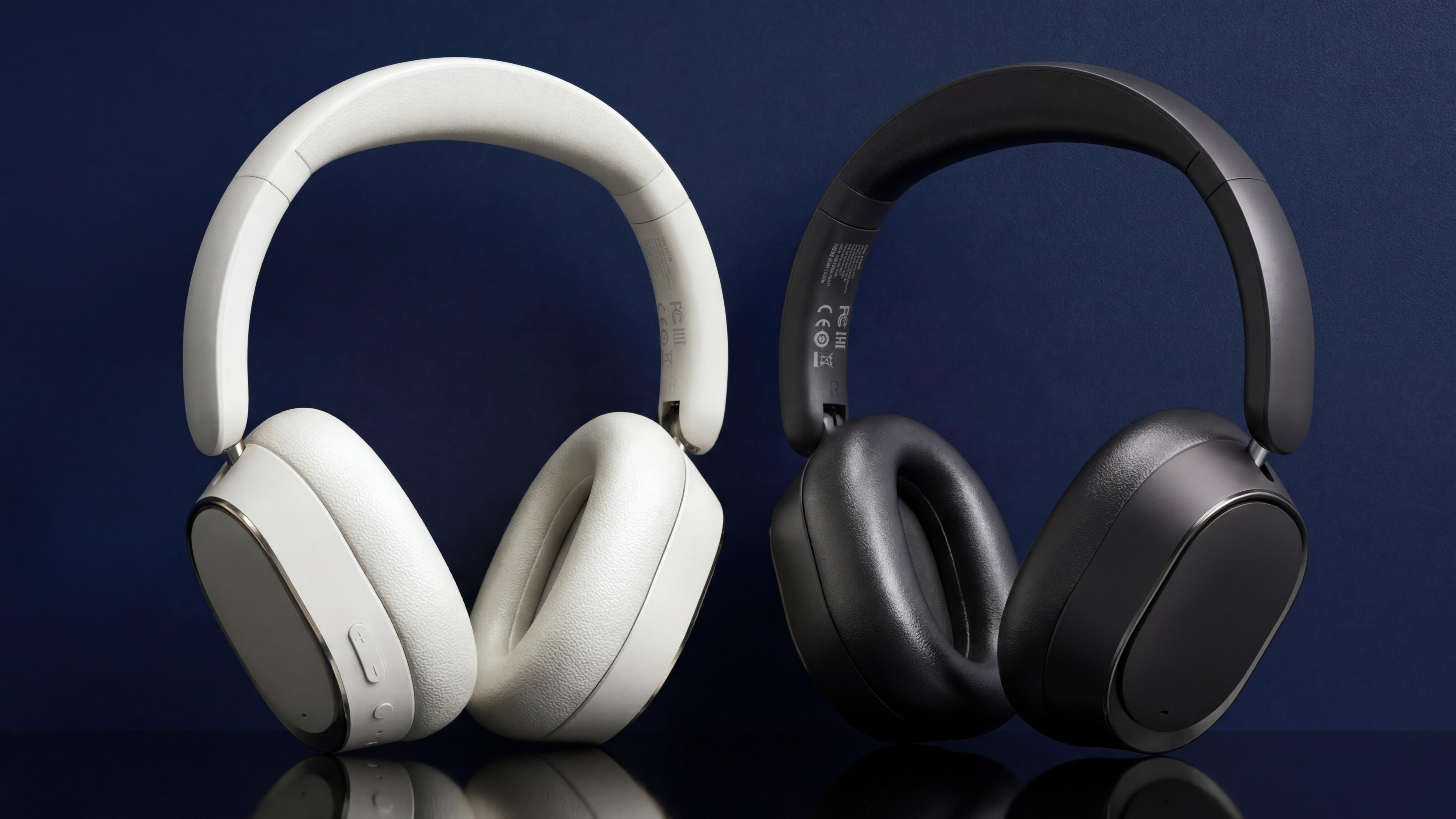 FiiO EH13 wireless headphones: one pair in white, one in black