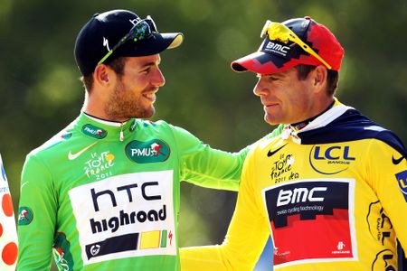PARIS, FRANCE - JULY 24: Green Jersey winner Mark Cavendish (L) of team HTC celebrates on the podium with yellow jersey winner Cadel Evans of team BMC after the twenty first and final stage of Le Tour de France 2011, from Creteil to the Champs-Elysees in Paris on July 24, 2011 in Paris, France. (Photo by Bryn Lennon/Getty Images)