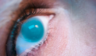 Sleep Awake trailer still showing an eye with a clouded lens.