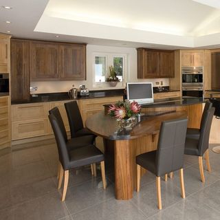 kitchen with wooden area and table and chair
