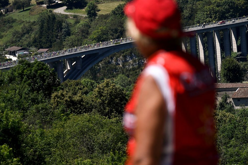 The peloton crosses a bridge during the 2016 Tour de France.