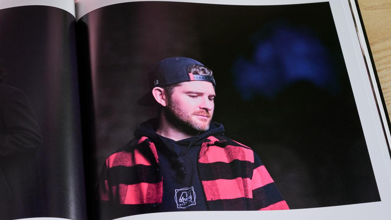 Vista Print photo book open on page with photo of man