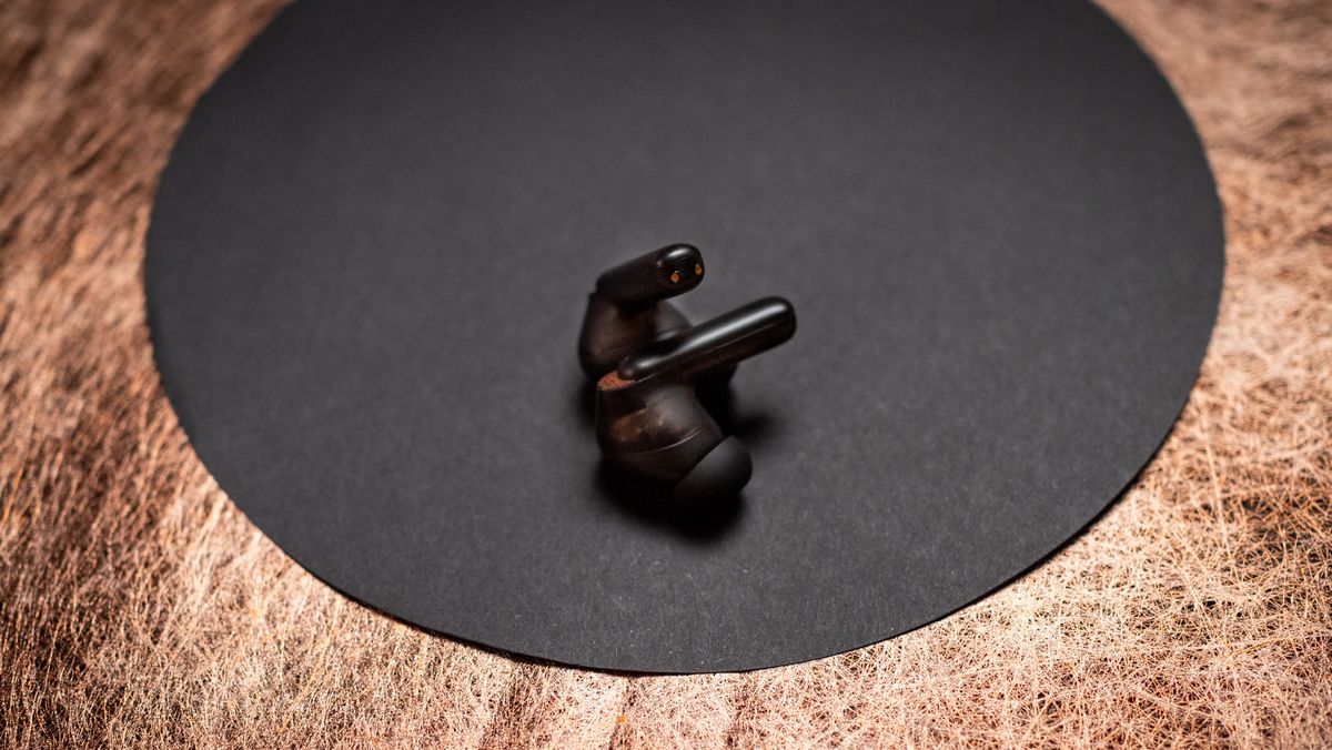 Creative Aurvana Ace 2 earbuds on a table