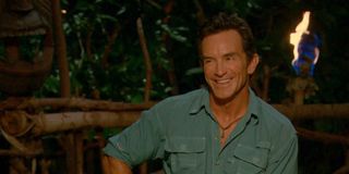 Jeff Probst laughing at tribal council