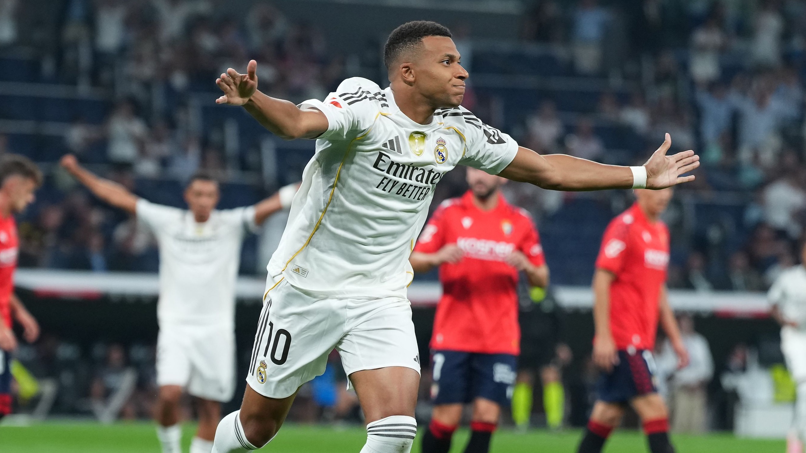 Kylian Mbappé of Real Madrid celebrates scoring his team's first goal the LaLiga EA Sports match between Real Madrid CF and CA Osasuna at Estadio Santiago Bernabeu on August 19, 2025 in Madrid, Spain.