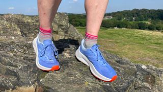 Woman wearing Adidas Terrex Soulstride Flow trail running shoes