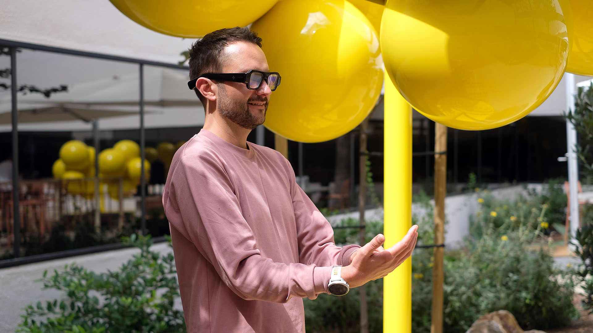 A photo of a person wearing Snap Specs.