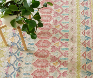 A colorful flatweave rug in closeup