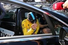 Tony Martin gets in the Etixx Quickstep car but vows to be back