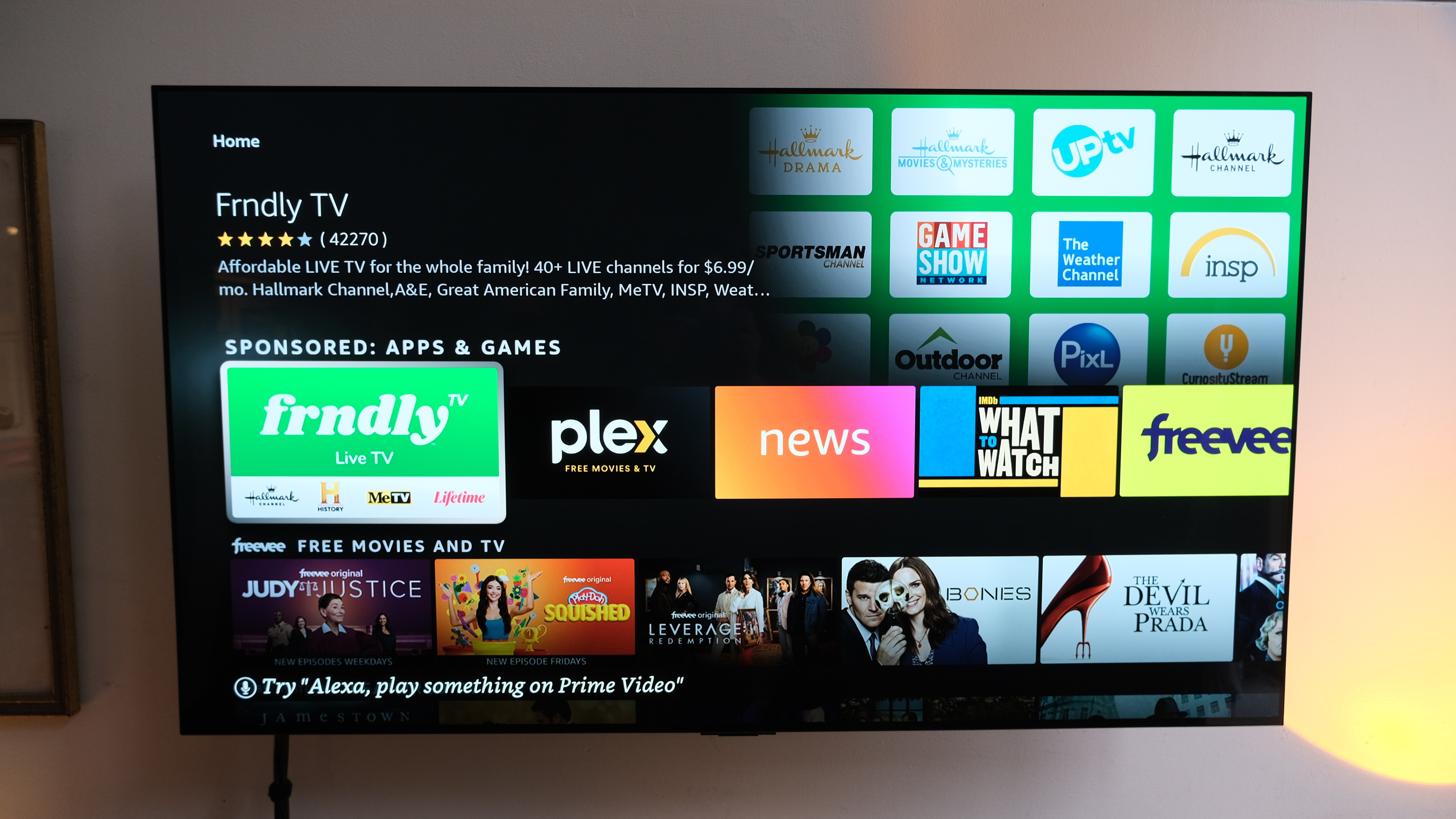 amazon fire tv stick interface with sponsored apps strip