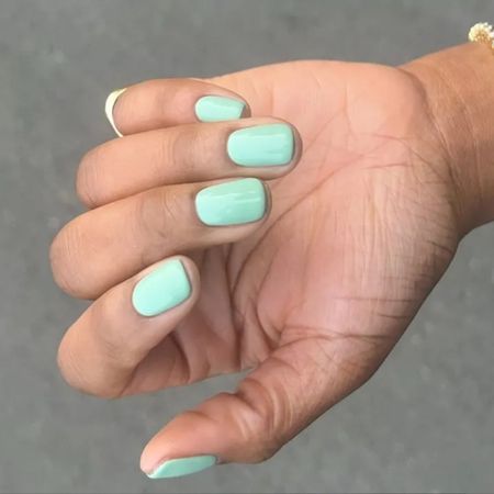 A mint green manicure