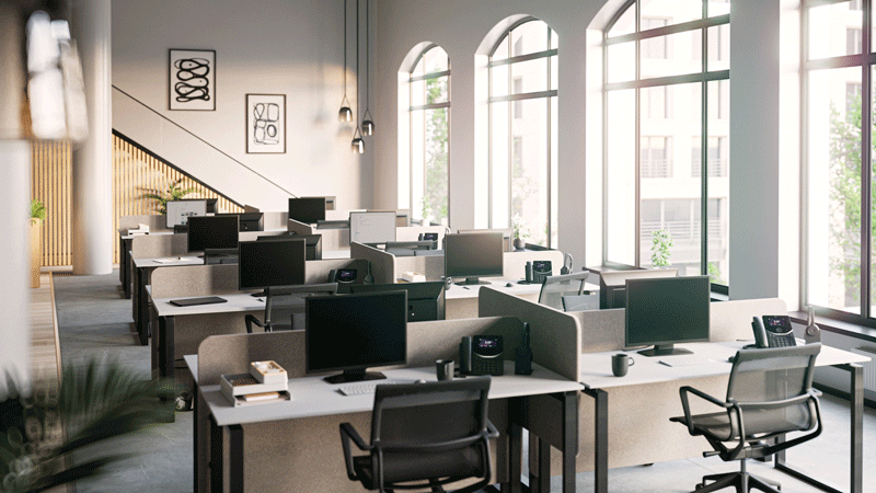 A hybrid office with empty desks and Cisco solutions. 