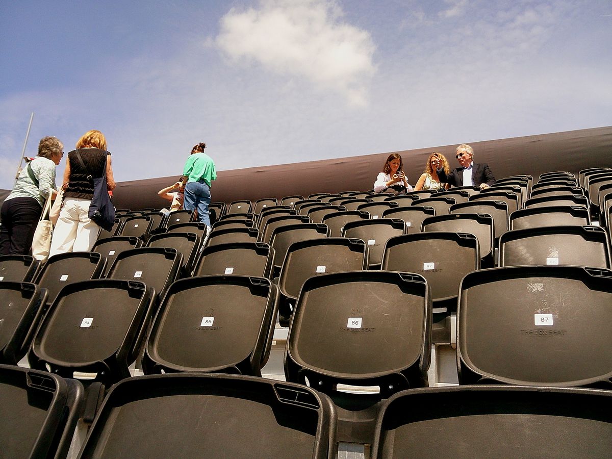 Sample image taken with Camp Snap 2 digital compact camera, showing people sitting in stadium stand seats