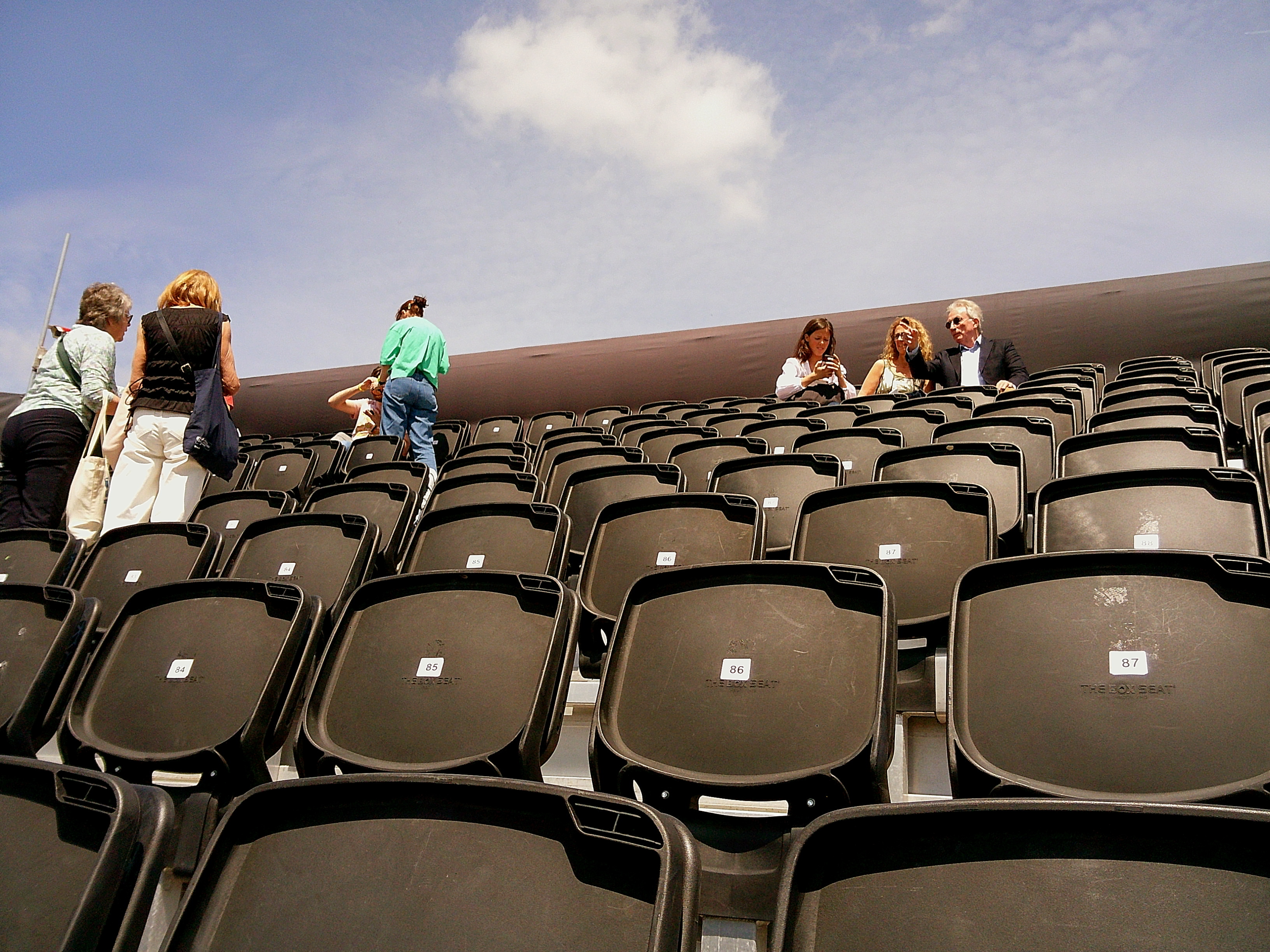 Sample image taken with Camp Snap 2 digital compact camera, showing people sitting in stadium stand seats