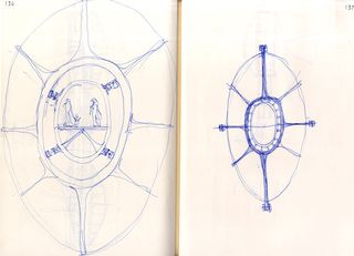 Two blue pen sketches of oval object