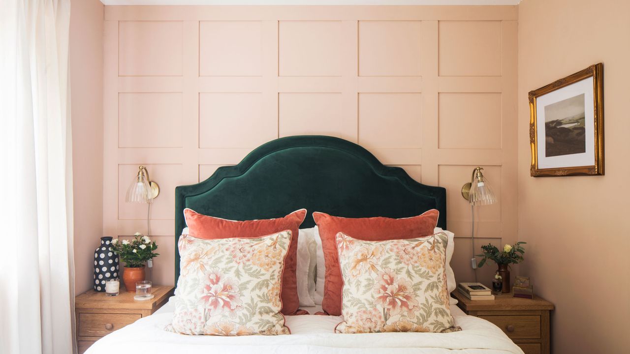 Pink bedroom with green velvet headboard