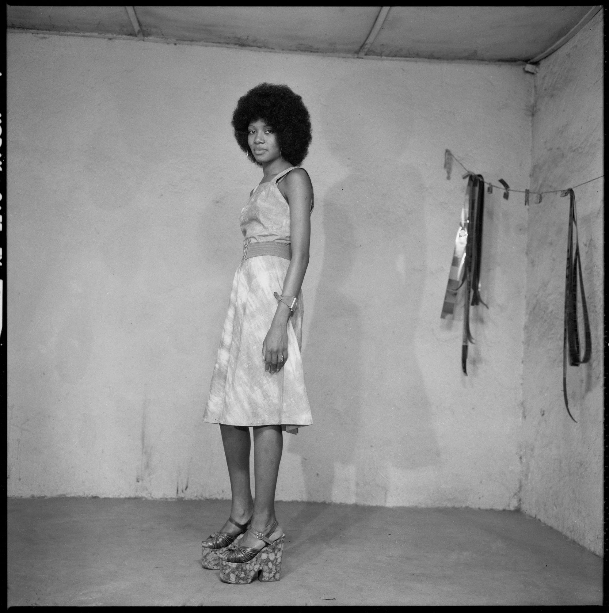 black and white portrait of a woman by Seydou Keïta