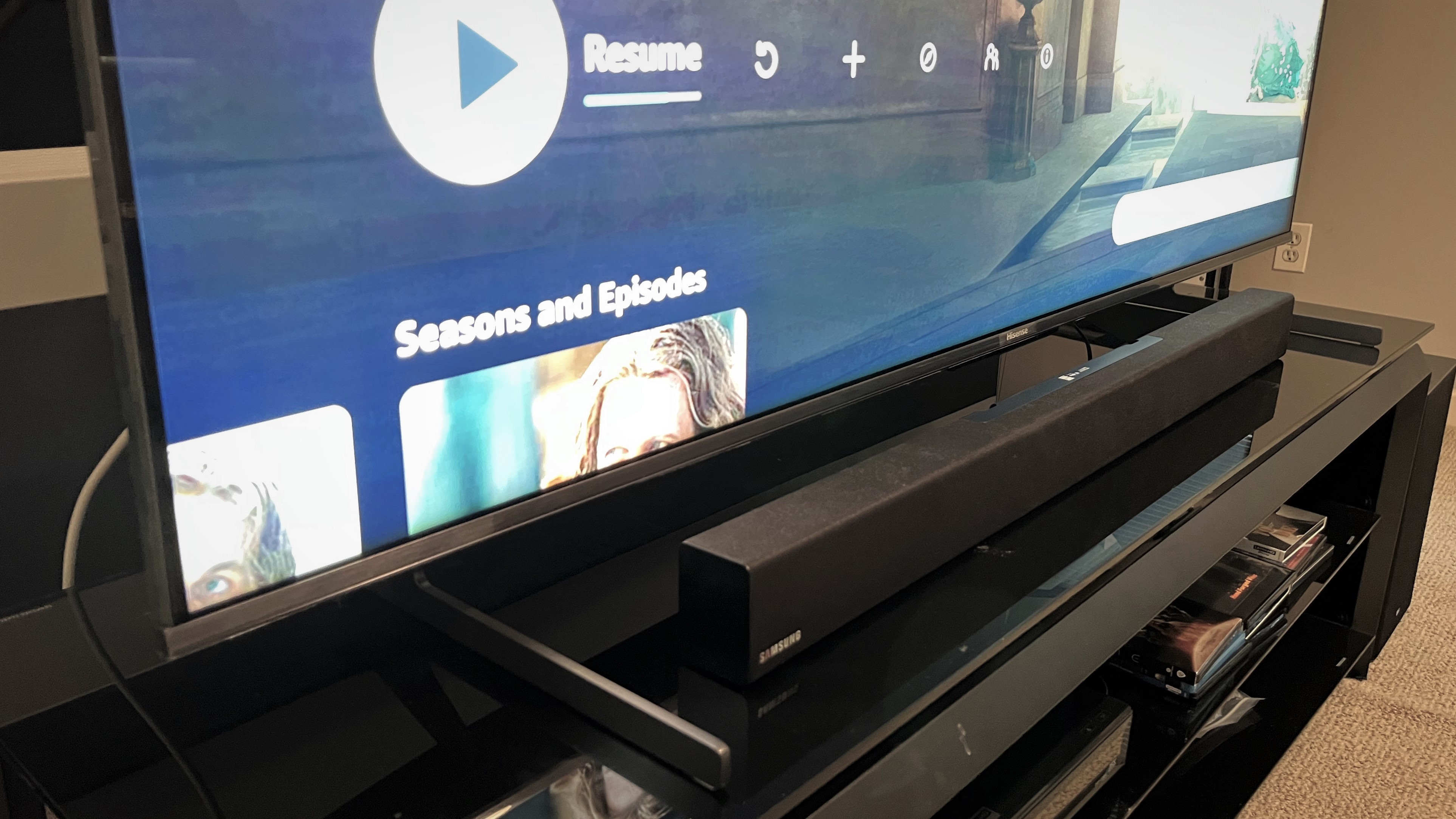 Hisense U8H TV on stand