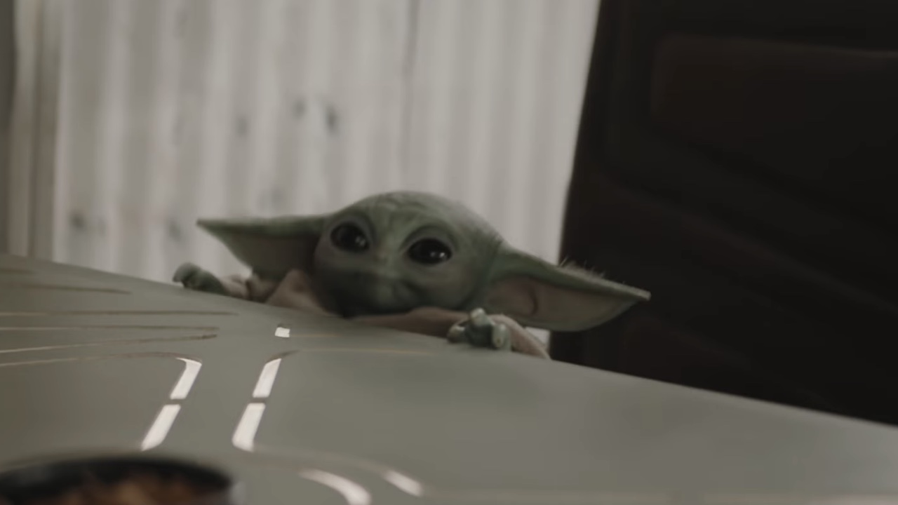 Grogu at a table