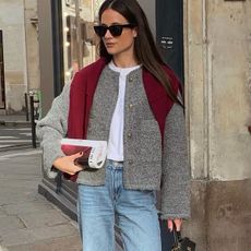 woman in gray jacket and jeans